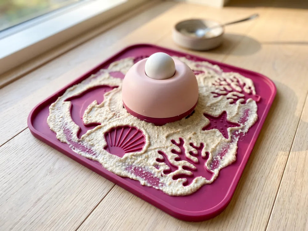 The petal-maze feeder bowl filled with kibble