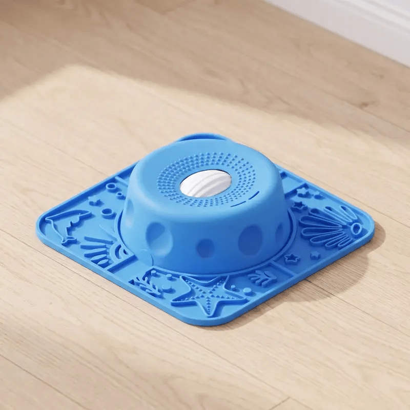 The Lapwell lick mat with its rolling-ball dome
